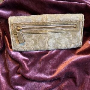 Gold and natural signature turn lock Coach wallet